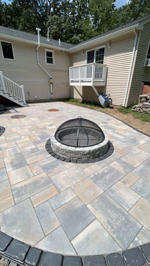 Unilock patio and fire pit. Douglas, MA. Photo 1.
